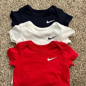 3 Nike 12 month onesies